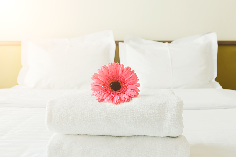 neatly made bed, Kelly's Kleaning LLC provides residential cleaning services to individuals in and around Ephrata PA, Elizabethtown PA, Sinking Spring PA and Wyomissing PA.